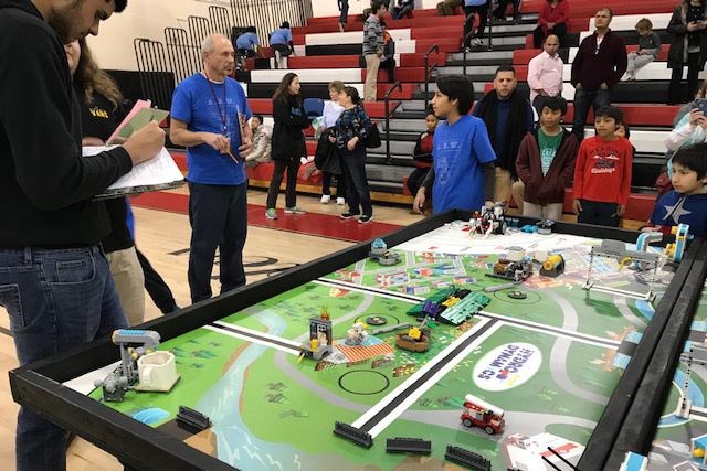 Students participate in a robotics competition